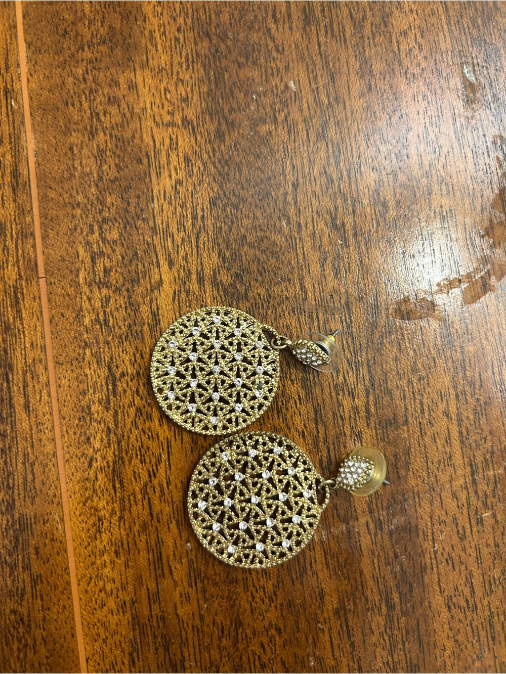 Gold round dangle earrings
